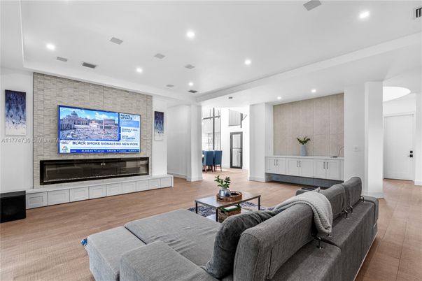 Interior, Living room, Recessed Lighting, Stone Walls, Wood Texture Flooring