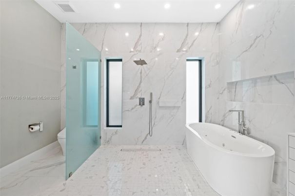 Bathroom, Free Standing Baths, Glass Shower, Interior, Marble, Marble Walls, Recessed Lighting