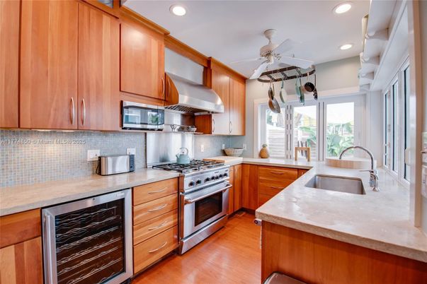 Interior, Kitchen, Recessed Lighting, Stainless Steel Appliances, Wood Texture Flooring