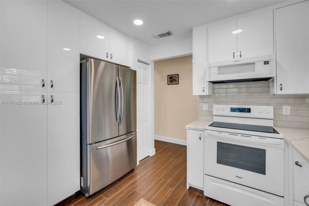 Interior, Kitchen, Recessed Lighting, Stainless Steel Appliances, Wood Texture Flooring
