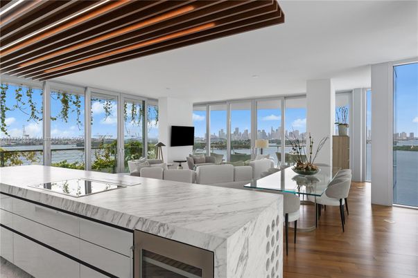 Dining room, Interior, Kitchen, Living room, Recessed Lighting, Water, Wooden Beams, Wood Texture Flooring
