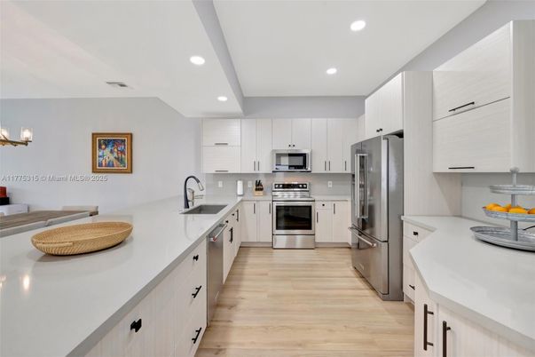 Interior, Kitchen, Recessed Lighting, Stainless Steel Appliances, Wood Texture Flooring