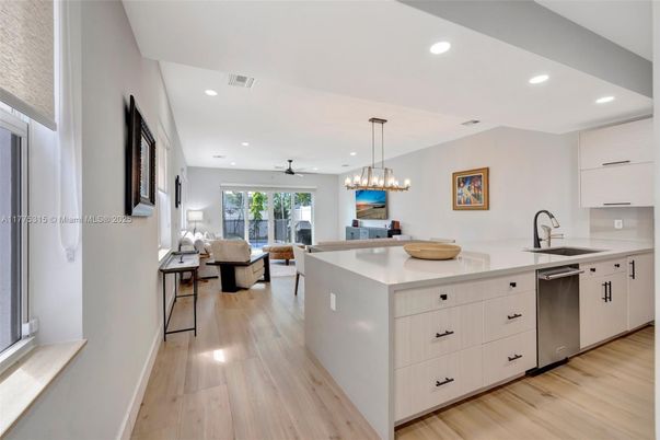 Dining room, Interior, Kitchen, Living room, Pendant Lights, Recessed Lighting, Stainless Steel Appliances, Wood Texture Flooring