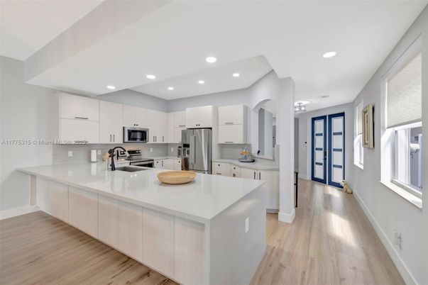 Interior, Kitchen, Recessed Lighting, Stainless Steel Appliances, Wood Texture Flooring