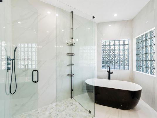 Bathroom, Free Standing Baths, Glass Shower, Interior, Marble, Marble Walls, Recessed Lighting