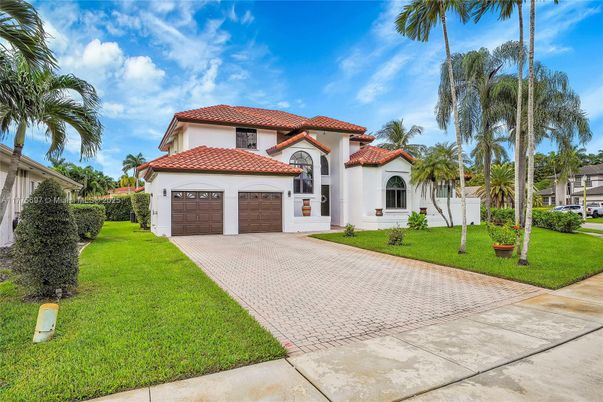 Attached, Backyard, Exterior, Facade, Spanish Mediterranean