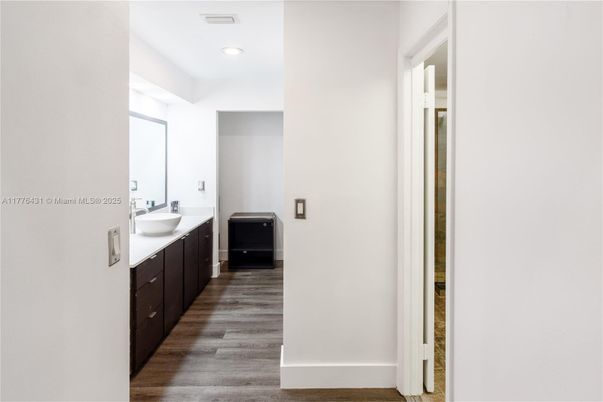 Bathroom, Dual Sink Vanities, Interior, Recessed Lighting, Wood Texture Flooring