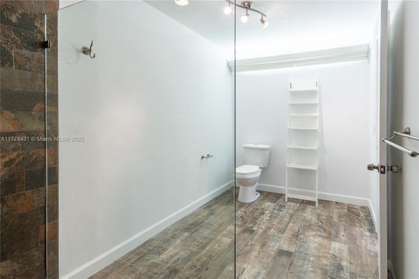 Bathroom, Glass Shower, Interior, Recessed Lighting, Wood Texture Flooring