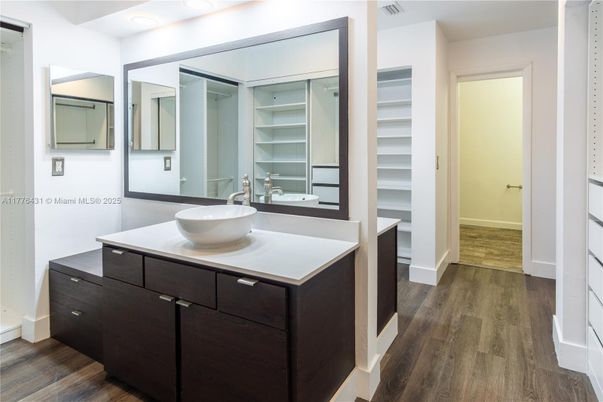 Bathroom, Dual Sink Vanities, Interior, Walk-in Closets, Wood Texture Flooring