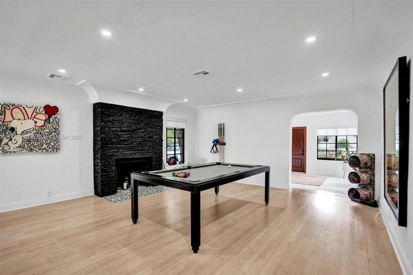 Billiard Table, Fireplace, Game Room, Interior, Recessed Lighting, Stone Walls, Wood Texture Flooring