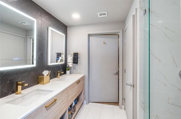 Bathroom, Dual Sink Vanities, Interior, Marble, Marble Walls, Recessed Lighting