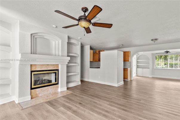Empty room, Fireplace, Interior, Recessed Lighting, Wood Texture Flooring