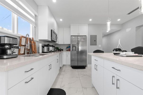 Interior, Kitchen, Marble, Pendant Lights, Recessed Lighting, Stainless Steel Appliances