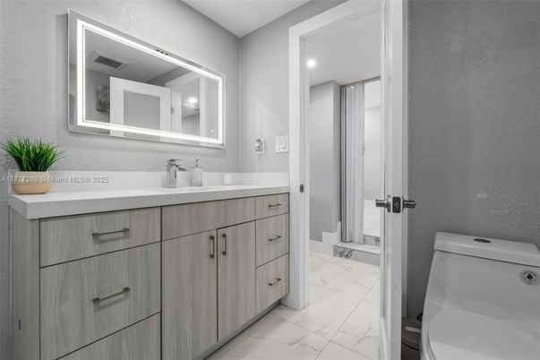 Bathroom, Dual Sink Vanities, Interior, Marble, Recessed Lighting