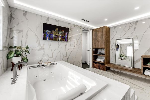 Bathroom, Dual Sink Vanities, Interior, Marble, Marble Walls, Recessed Lighting