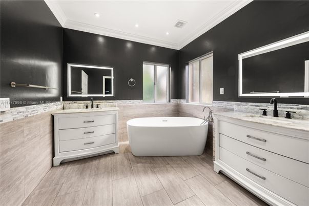 Bathroom, Dual Sink Vanities, Free Standing Baths, Interior, Recessed Lighting, Wood Texture Flooring