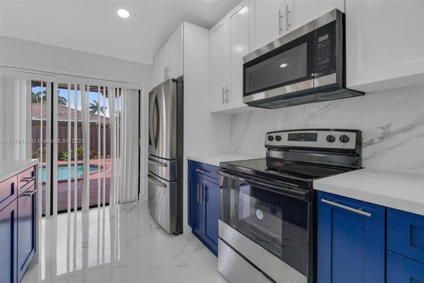 Interior, Kitchen, Marble, Marble Walls, Recessed Lighting, Stainless Steel Appliances