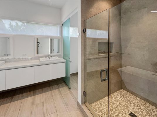 Bathroom, Dual Sink Vanities, Glass Shower, Interior, Wood Texture Flooring