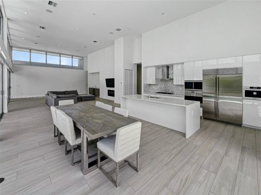 Dining room, Interior, Kitchen, Living room, Recessed Lighting, Stainless Steel Appliances, Wood Texture Flooring
