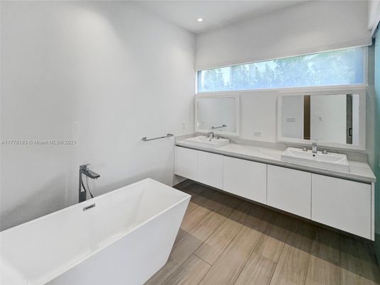 Bathroom, Dual Sink Vanities, Free Standing Baths, Interior, Recessed Lighting, Wood Texture Flooring