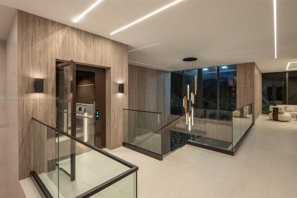 Elevator, Interior, Marble, Pendant Lights, Recessed Lighting, Wooden Walls