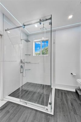 Bathroom, Glass Shower, Interior, Recessed Lighting, Wood Texture Flooring