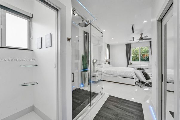 Bathroom, Bedroom, Glass Shower, Interior, Recessed Lighting, Wood Texture Flooring