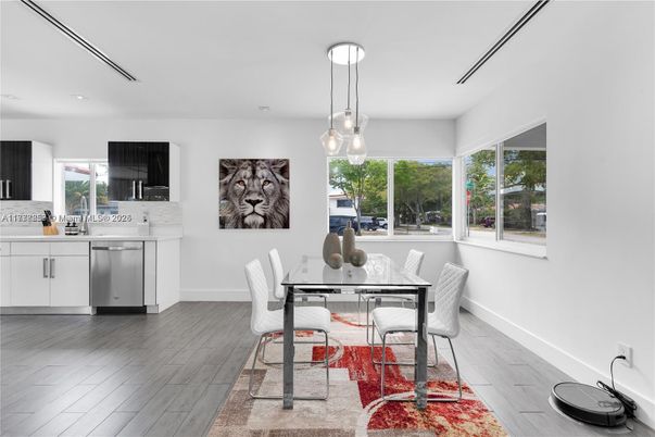 Dining room, Interior, Kitchen, Pendant Lights, Recessed Lighting, Stainless Steel Appliances, Wood Texture Flooring