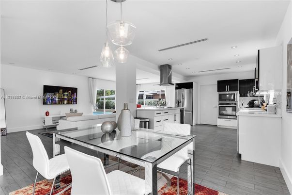 Dining room, Interior, Kitchen, Living room, Pendant Lights, Recessed Lighting, Stainless Steel Appliances, Wood Texture Flooring