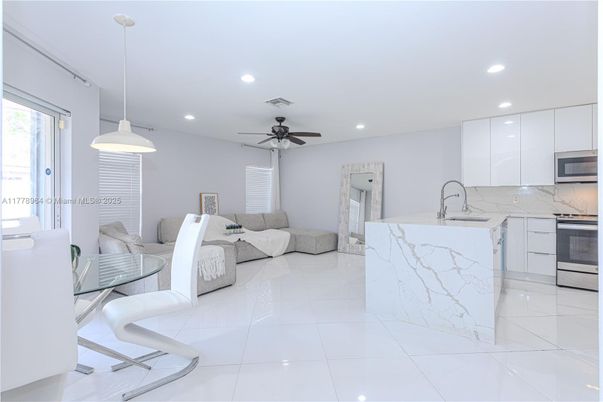 Interior, Kitchen, Living room, Marble Walls, Pendant Lights, Recessed Lighting, Stainless Steel Appliances