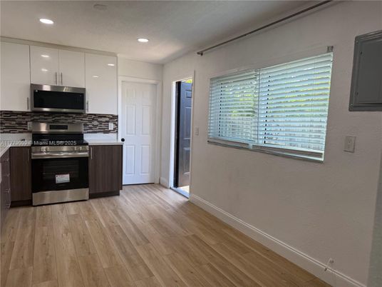 Interior, Kitchen, Recessed Lighting, Stainless Steel Appliances, Wood Texture Flooring