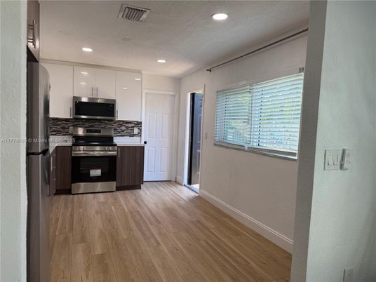 Interior, Kitchen, Recessed Lighting, Stainless Steel Appliances, Wood Texture Flooring