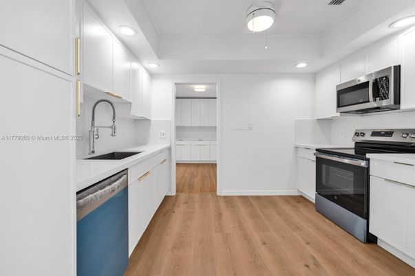 Interior, Kitchen, Recessed Lighting, Stainless Steel Appliances, Wood Texture Flooring