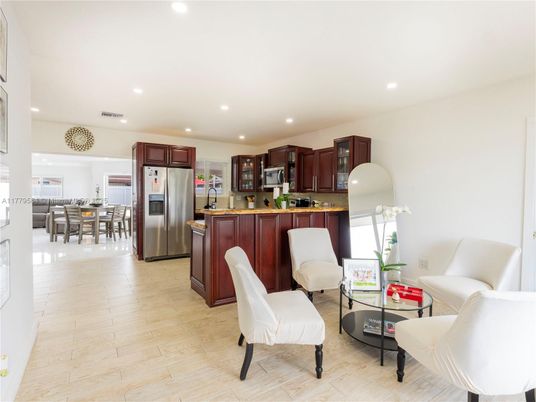 Dining room, Interior, Kitchen, Recessed Lighting, Stainless Steel Appliances, Wood Texture Flooring