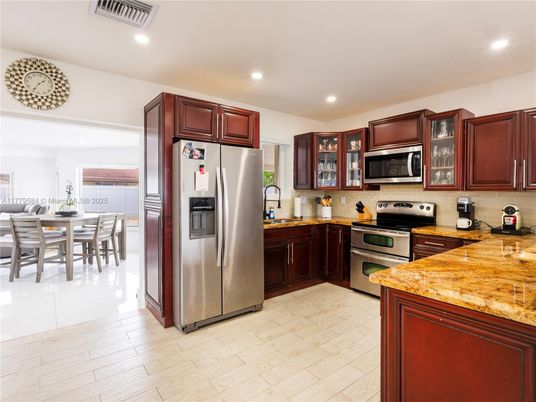 Dining room, Interior, Kitchen, Recessed Lighting, Stainless Steel Appliances, Wood Texture Flooring