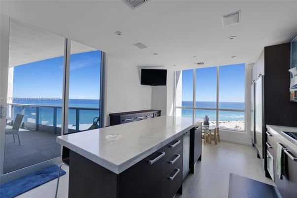 Interior, Kitchen, Recessed Lighting, Stainless Steel Appliances, Water, Wood Texture Flooring