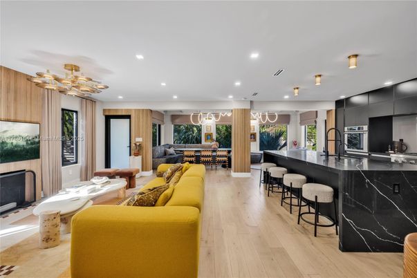 Dining room, Interior, Kitchen, Living room, Pendant Lights, Recessed Lighting, Stainless Steel Appliances, Wood Texture Flooring