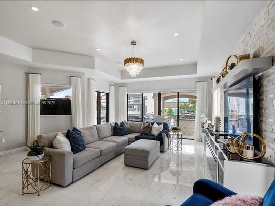 Chandelier, Fireplace, Interior, Living room, Marble, Recessed Lighting, Stone Walls