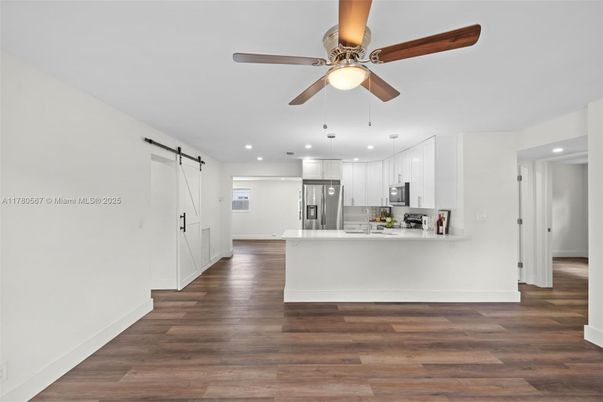 Interior, Kitchen, Pendant Lights, Recessed Lighting, Stainless Steel Appliances, Wood Texture Flooring