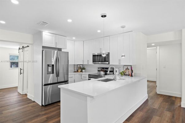 Interior, Kitchen, Pendant Lights, Recessed Lighting, Stainless Steel Appliances, Wood Texture Flooring