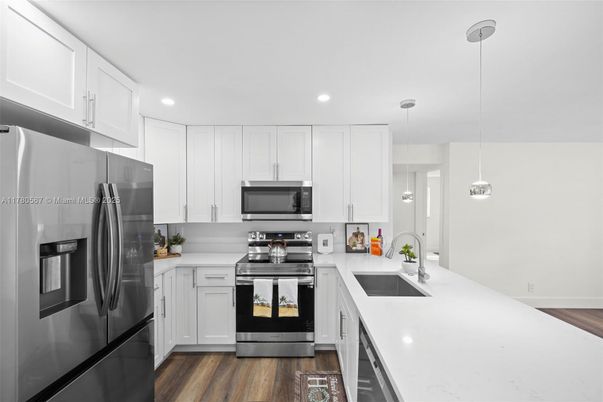 Interior, Kitchen, Pendant Lights, Recessed Lighting, Stainless Steel Appliances, Wood Texture Flooring