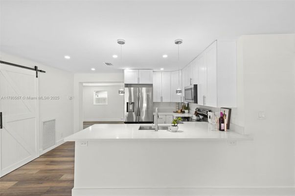Interior, Kitchen, Pendant Lights, Recessed Lighting, Stainless Steel Appliances, Wood Texture Flooring