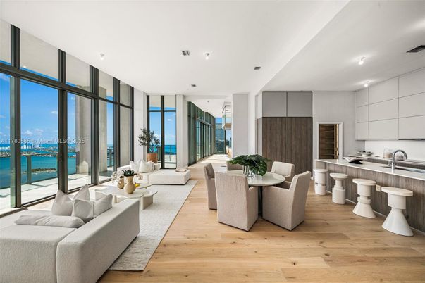 Dining room, Interior, Kitchen, Living room, Recessed Lighting, Water, Wood Texture Flooring