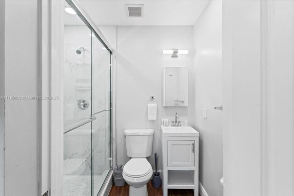 Bathroom, Glass Shower, Interior, Marble Walls, Wood Texture Flooring