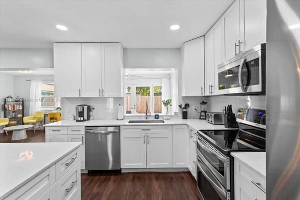 Interior, Kitchen, Recessed Lighting, Stainless Steel Appliances, Wood Texture Flooring