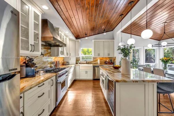 Dining room, Interior, Kitchen, Pendant Lights, Recessed Lighting, Stainless Steel Appliances, Wooden Ceilings, Wood Texture Flooring