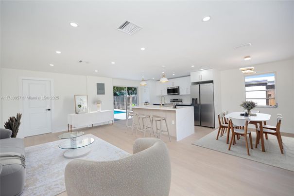 Dining room, Interior, Kitchen, Pendant Lights, Recessed Lighting, Stainless Steel Appliances, Wood Texture Flooring