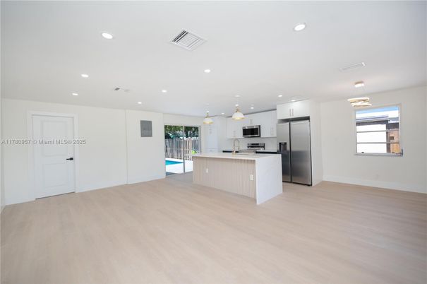 Interior, Kitchen, Pendant Lights, Recessed Lighting, Stainless Steel Appliances, Wood Texture Flooring