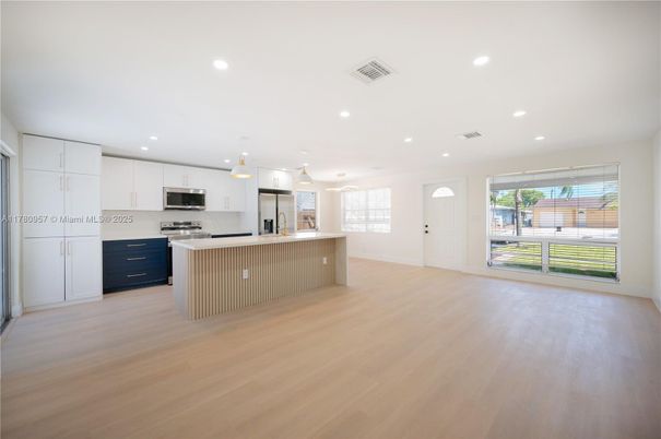 Interior, Kitchen, Pendant Lights, Recessed Lighting, Stainless Steel Appliances, Wood Texture Flooring
