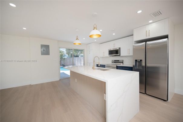 Interior, Kitchen, Pendant Lights, Recessed Lighting, Stainless Steel Appliances, Wood Texture Flooring